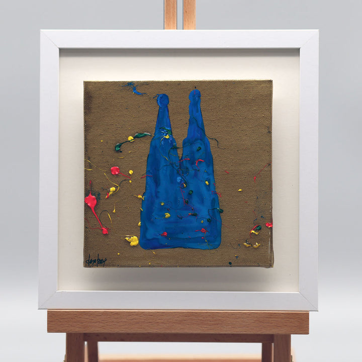 Acrylbild Kölner Dom in Blau mit farbigen Spritzern auf Leinwand im weißen Rahmen von Pixel Cafe Cologne