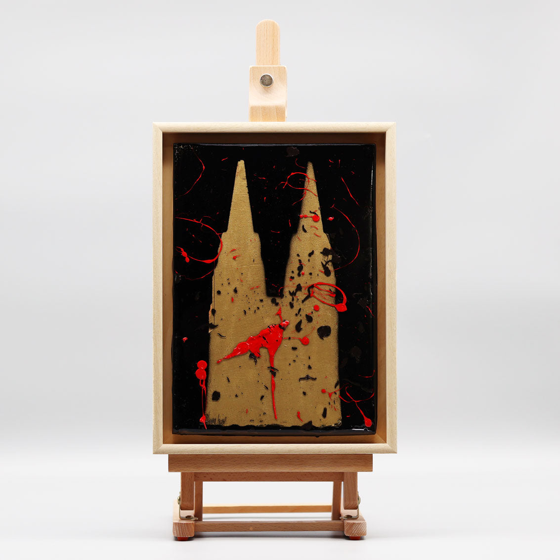 Kölner Dom Acrylbild kaufen von Pixel Cafe Cologne mit modernem schwarzen und roten Kunstdesign auf Staffelei